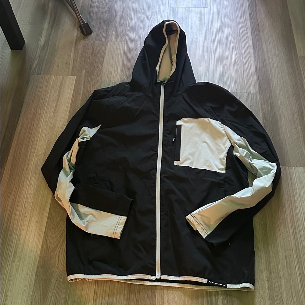 Black and gray Hooded rain Jacket be boundless waterproof worn once
